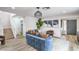 Stylish living room featuring modern furnishings, wood-look floors, and ample natural light at 10009 Coral Sands Dr, Las Vegas, NV 89117