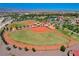 Overhead view of a well-kept community baseball field under a clear blue sky at 1014 Solemn Cactus Ave, North Las Vegas, NV 89031
