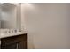 Clean half-bathroom featuring modern vanity, fixtures, and stylish finishes at 1014 Solemn Cactus Ave, North Las Vegas, NV 89031