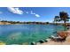 Picturesque pond featuring clear turquoise water and visible aquatic life, nestled within a natural setting at 1014 Solemn Cactus Ave, North Las Vegas, NV 89031