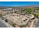 Aerial shot of an expansive skate park with various ramps and features, adjacent to residential areas and green spaces at 1014 Solemn Cactus Ave, North Las Vegas, NV 89031