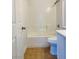Cozy bathroom featuring a shower-tub combo with tiled walls and neutral vanity at 10238 Missouri Meadows St, Las Vegas, NV 89183