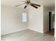 Bright bedroom with light wood-look flooring, a window, and ceiling fan at 10238 Missouri Meadows St, Las Vegas, NV 89183