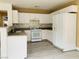 Functional kitchen featuring white cabinetry, modern appliances, and ample counter space at 10238 Missouri Meadows St, Las Vegas, NV 89183