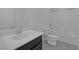 Bathroom featuring a sink, toilet, and shower/bath at 10273 Fragrant Apple Ct, Las Vegas, NV 89141