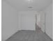 Bedroom with closet, carpeted floors and access to another room at 10273 Fragrant Apple Ct, Las Vegas, NV 89141