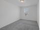 Bedroom with carpeted floors and a window at 10273 Fragrant Apple Ct, Las Vegas, NV 89141