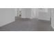 Hallway featuring gray carpet flooring, white walls, and staircase at 10273 Fragrant Apple Ct, Las Vegas, NV 89141