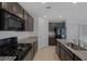 Well-equipped kitchen featuring granite counters, stainless appliances, and ample cabinet space at 10273 Fragrant Apple Ct, Las Vegas, NV 89141