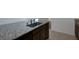Close-up of the island sink with granite counters and stylish fixtures at 10273 Fragrant Apple Ct, Las Vegas, NV 89141