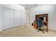 Office space and storage area in the bedroom with carpet floors, a closet and desk and chair at 10389 Walking View Ct, Las Vegas, NV 89135
