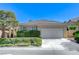 Charming single-story home with a two-car garage and mature landscaping at 10389 Walking View Ct, Las Vegas, NV 89135