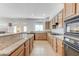 Spacious kitchen featuring stone countertops and lots of cabinet space at 10389 Walking View Ct, Las Vegas, NV 89135