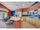 Well-equipped kitchen with stainless steel appliances, breakfast bar, and ample counter space at 1421 Via Savona Dr, Henderson, NV 89052