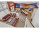 Spacious living room with hardwood floors and an open concept kitchen at 1421 Via Savona Dr, Henderson, NV 89052