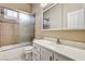 Bathroom with white vanity, tile flooring, and a shower with sliding glass doors at 1574 Livingston Dr, Henderson, NV 89012