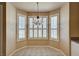 Eat-in kitchen/nook featuring tiled flooring, plantation shutters and pendant lighting at 1574 Livingston Dr, Henderson, NV 89012