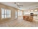 Spacious open-concept kitchen with tile floors, island seating, and plenty of counter space at 1574 Livingston Dr, Henderson, NV 89012