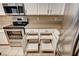 Kitchen boasts pull out drawers, granite countertops, stainless steel appliances at 1574 Livingston Dr, Henderson, NV 89012