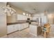 A bright kitchen complete with tile flooring, granite countertops and stainless appliances at 1574 Livingston Dr, Henderson, NV 89012