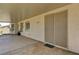 Spacious covered patio with concrete floors and access to the backyard at 1574 Livingston Dr, Henderson, NV 89012