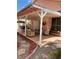 Covered back patio with seating, ceiling fans, and tiled flooring at 1853 Citroen St, Las Vegas, NV 89142