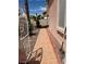 Backyard area features a tiled walkway, plants and desert landscaping at 1853 Citroen St, Las Vegas, NV 89142