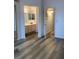 View of bedroom with hallway and bathroom through open doors at 1853 Citroen St, Las Vegas, NV 89142