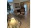 Bright living room with high ceilings, neutral decor, fireplace, and comfortable seating area at 1853 Citroen St, Las Vegas, NV 89142