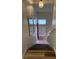Staircase featuring carpeted steps and wood flooring that leads into the home at 1853 Citroen St, Las Vegas, NV 89142