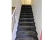 Carpeted staircase with white railing at 1853 Citroen St, Las Vegas, NV 89142