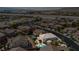 Stunning aerial view of a large private backyard with a sparkling pool and well-manicured landscaping at 2021 Royal Gardens Pl, North Las Vegas, NV 89084