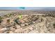 This home resides in a community near the Motor Speedway and mountains at 2021 Royal Gardens Pl, North Las Vegas, NV 89084