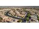 Scenic aerial view of the residential neighborhood with desert landscaping at 2021 Royal Gardens Pl, North Las Vegas, NV 89084