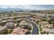 Wide aerial view of a suburban neighborhood with mountain views in the distance at 2021 Royal Gardens Pl, North Las Vegas, NV 89084