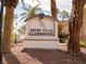 Resort Villas Clubhouse sign in front of well-maintained landscaping at 2050 W Warm Springs Rd # 411, Henderson, NV 89014