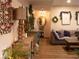 Inviting living room with wood-look floors and decorative details, creating a warm atmosphere at 2050 W Warm Springs Rd # 411, Henderson, NV 89014
