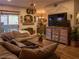 Relaxing living area with a plush sectional sofa, stylish decor, and lots of space at 2050 W Warm Springs Rd # 411, Henderson, NV 89014