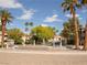 Community street view featuring water feature, landscaping, and palm trees at 2050 W Warm Springs Rd # 411, Henderson, NV 89014