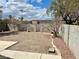Spacious backyard with desert landscaping, providing a low-maintenance outdoor living space at 2130 Dragonslayer Ave, Las Vegas, NV 89183