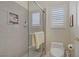 Modern bathroom featuring a glass-enclosed shower with built-in niche and updated fixtures at 2257 Lauren Dr, Las Vegas, NV 89134
