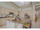 Well-appointed kitchen island with granite countertops, seating, and ample storage space at 2257 Lauren Dr, Las Vegas, NV 89134