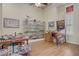 Spacious room with display cases, a pinball machine, and a custom wood floor design at 2257 Lauren Dr, Las Vegas, NV 89134