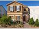 Charming two-story home with a beautifully landscaped front yard and inviting entryway at 2501 Rofrano Pl, Henderson, NV 89044