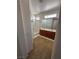 Bright bathroom features a double vanity sink, shower and lots of storage space at 2562 Downeyville Ave, Henderson, NV 89052