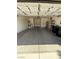 Spacious two-car garage featuring ample storage and utility connections, ready for customization and organization at 2562 Downeyville Ave, Henderson, NV 89052
