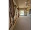Bright sun room with large windows, carpeted floors and direct access to backyard at 2562 Downeyville Ave, Henderson, NV 89052