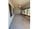 Spacious sun room featuring carpet floors, lots of natural light and a ceiling fan at 2562 Downeyville Ave, Henderson, NV 89052