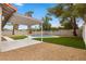 An inviting backyard featuring a pool, shaded pergola, and low-maintenance landscape at 2620 E Harmon Ave, Las Vegas, NV 89121