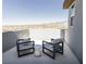Relax on this private balcony with seating and enjoy beautiful panoramic mountain views at 2650 Skylark Trail St, Henderson, NV 89044